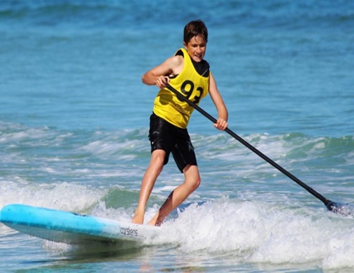 Find your balance, glide your worries away with stand-up paddleboarding - Water Sports